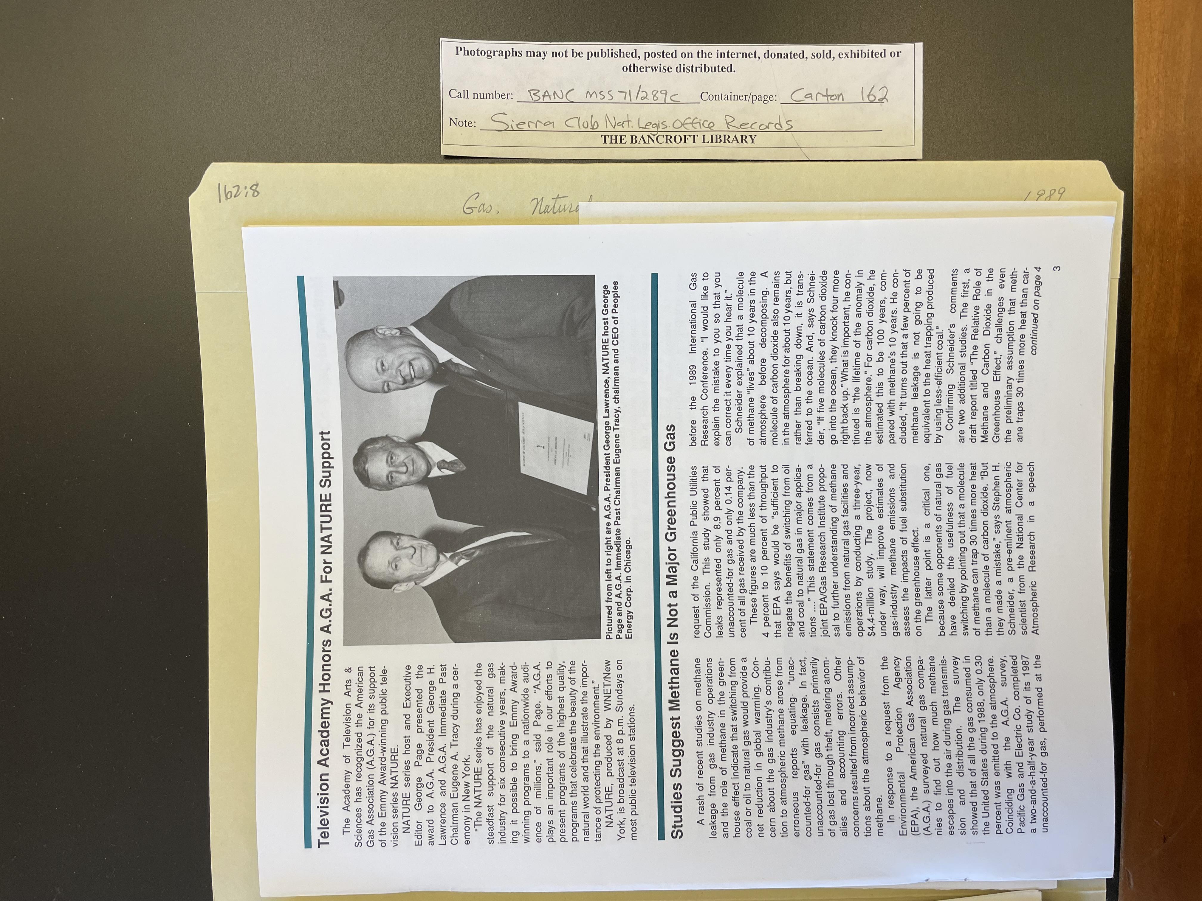 Original archival photograph of a 1990 American Gas Association Natural Resource newsletter page with a headline minimizing methane's role as a greenhouse gas